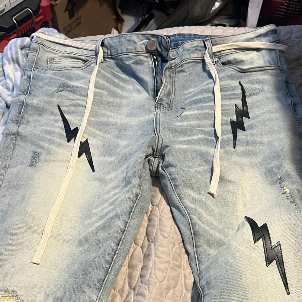 Light Blue THRT Distressed Jeans with Black Lightning Bolts